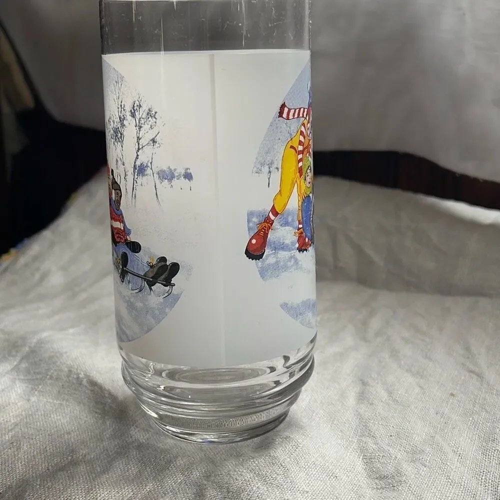 Vintage Ronald McDonald winter sled scene glass.